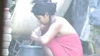 wow... awesome desi village beauty bathing outside