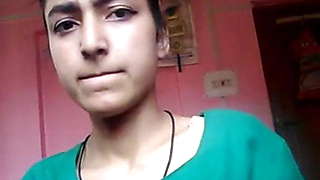 Sexy cute girl undresses, shows boobs & masturbates hard