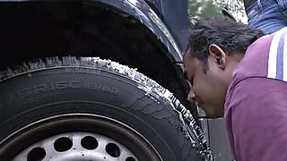 Madame Marissa feeding boot-cake to slave.